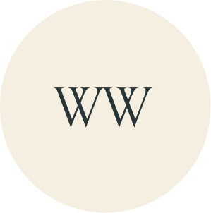 Cream circular monogram with WW initials.