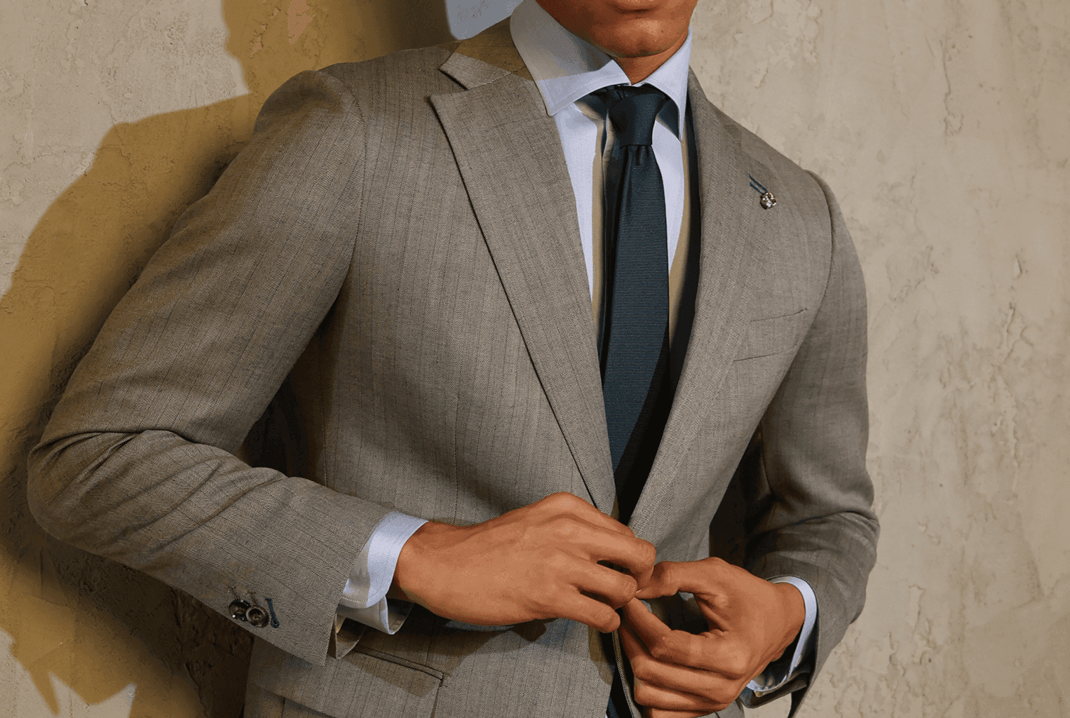 How Button Placement Influences the Look of a Suit Jacket