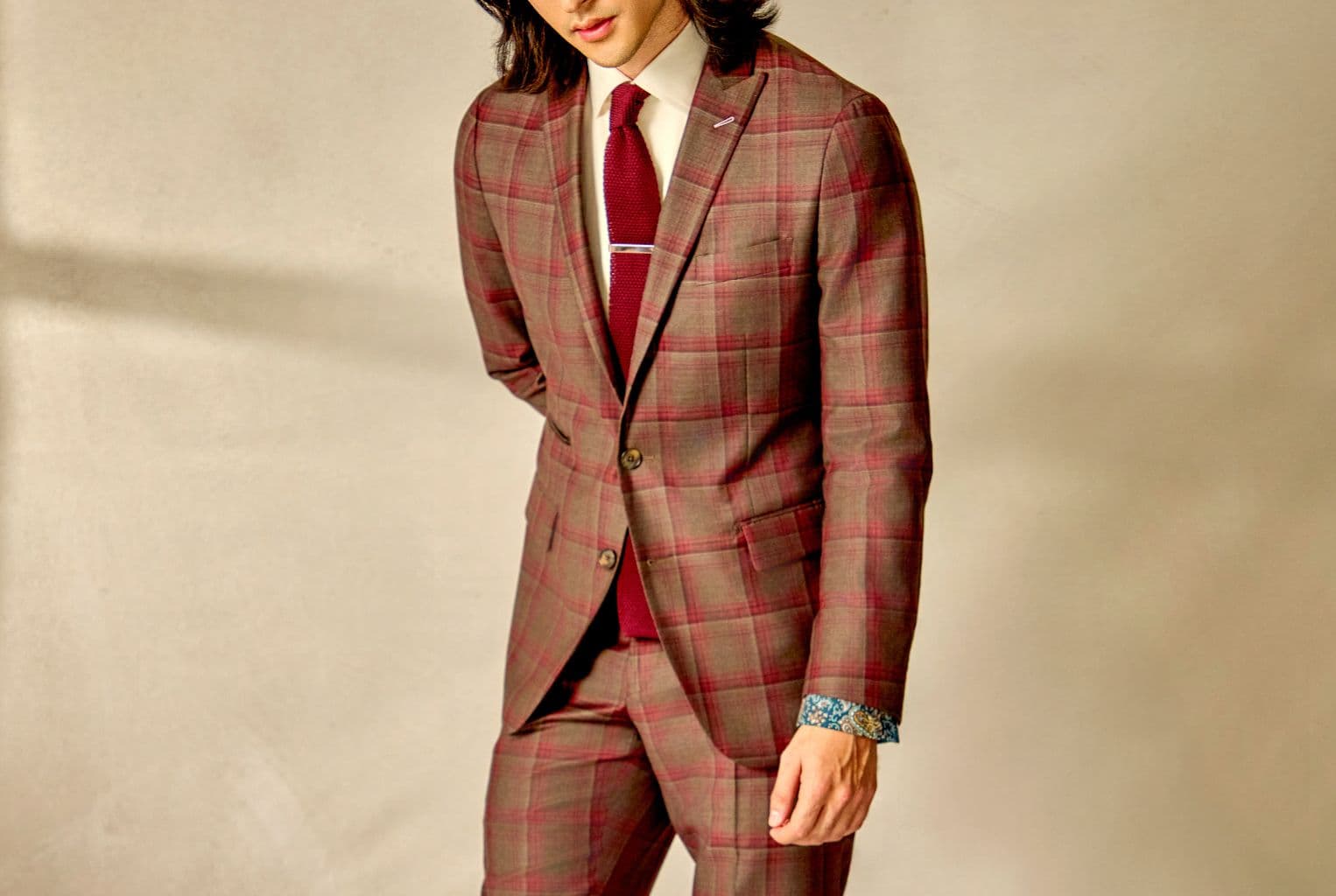 Close-up of a necktie styled with a tailored suit.